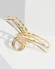 Gold Metal Open Loop Claw Clip sold by Collete Hayman
