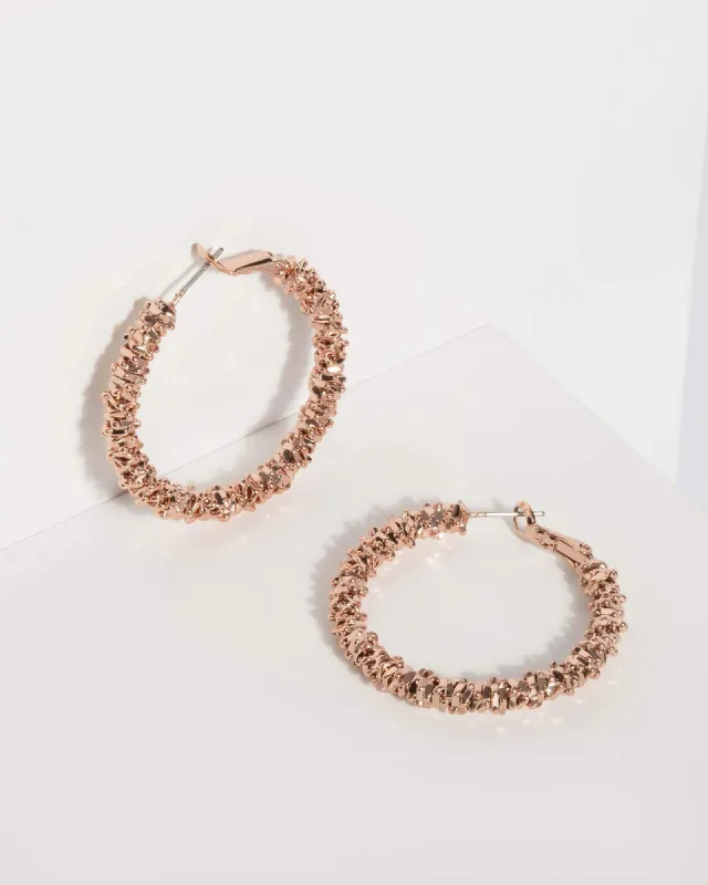 Rose Gold Twisted Metal Hoop Earrings sold by Collete Hayman