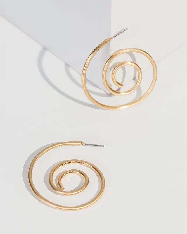 Gold Spiral Textured Metal Hoop Earrings sold by Collete Hayman
