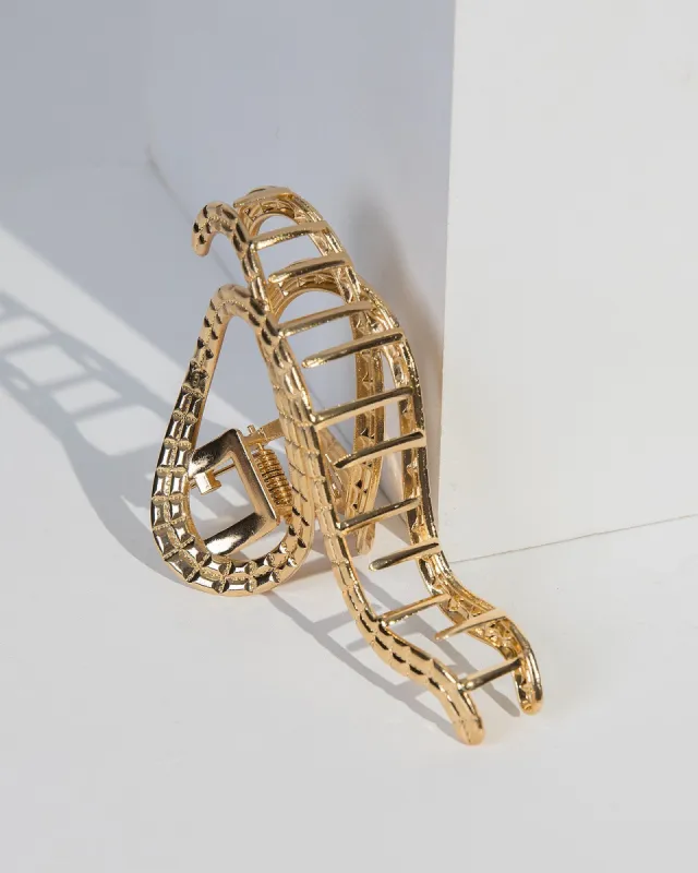 Gold Metal Swirl Detail Claw Clip sold by Collete Hayman