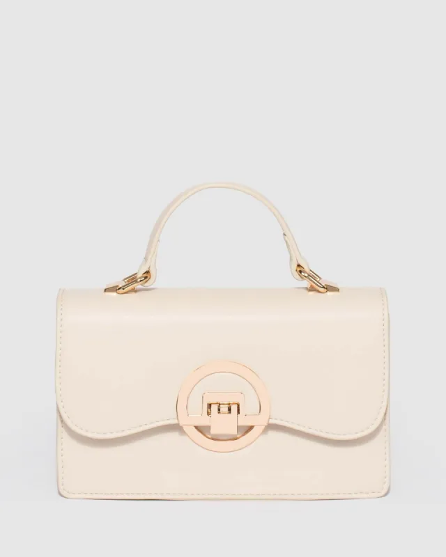 Ivory Tia Top Handle Bag sold by Collete Hayman
