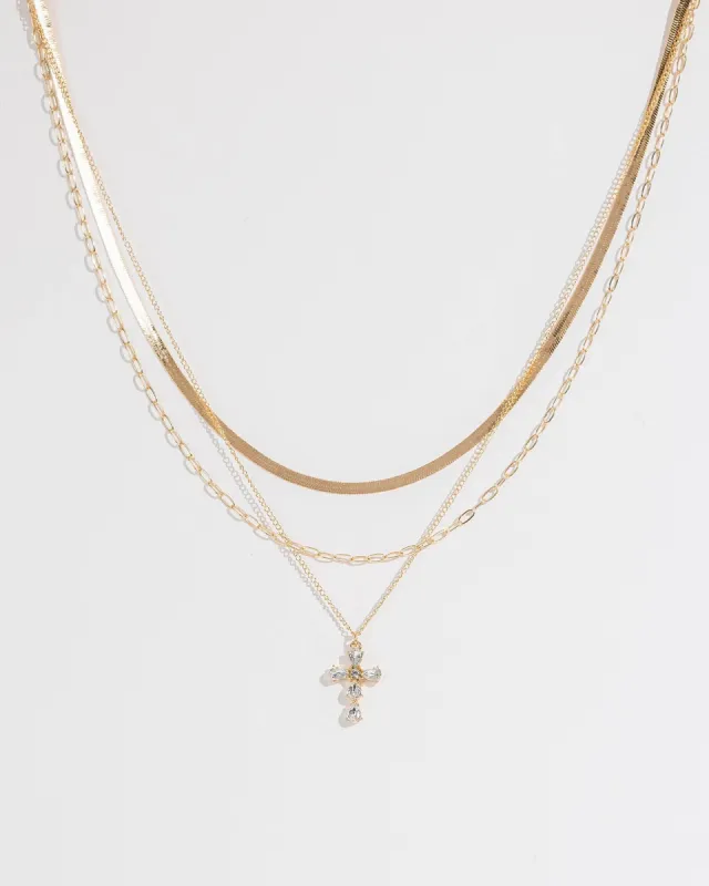 Gold Crystal Cross Layered Necklace sold by Collete Hayman