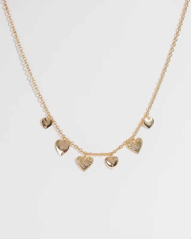 Gold Heart Pendants Necklace sold by Collete Hayman
