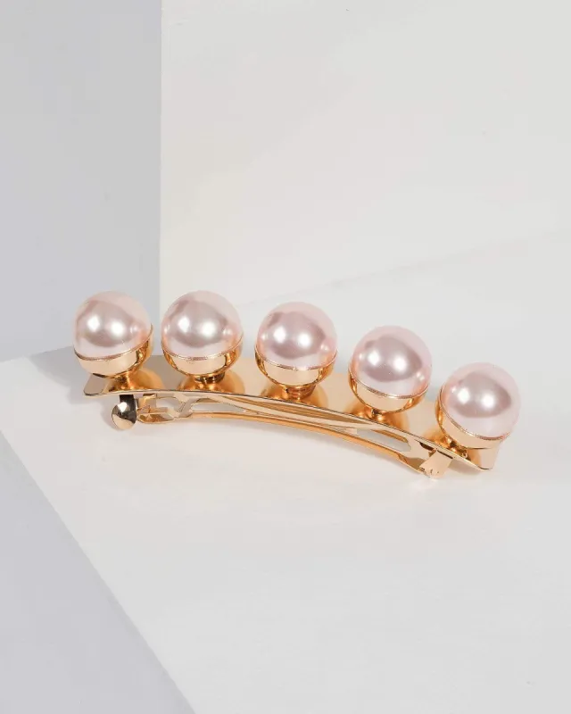 Gold Oversized Pearl Clip sold by Collete Hayman
