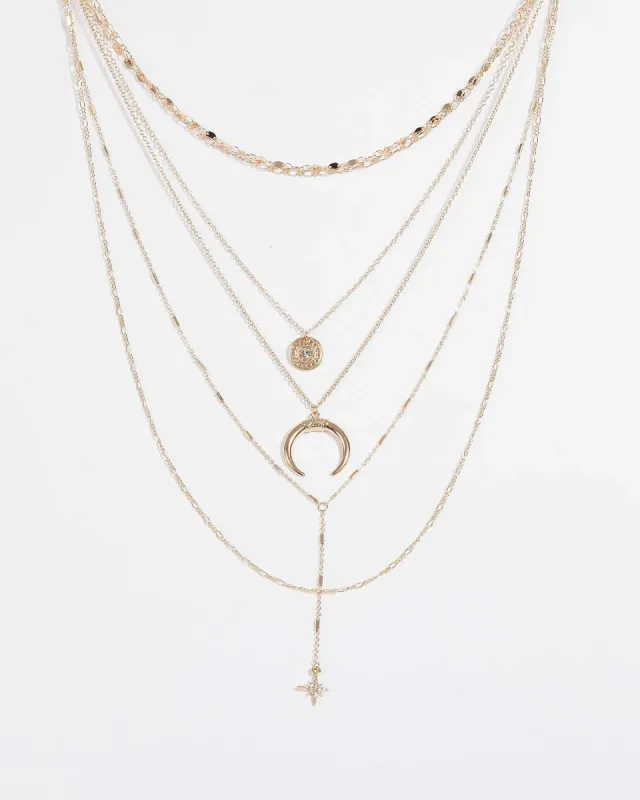 Gold Multi Layered Moon and Star Necklace sold by Collete Hayman