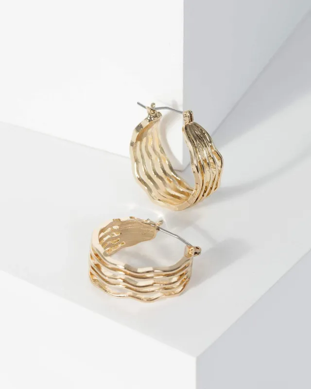Gold Metal Wave Texture Hoop Earrings sold by Collete Hayman