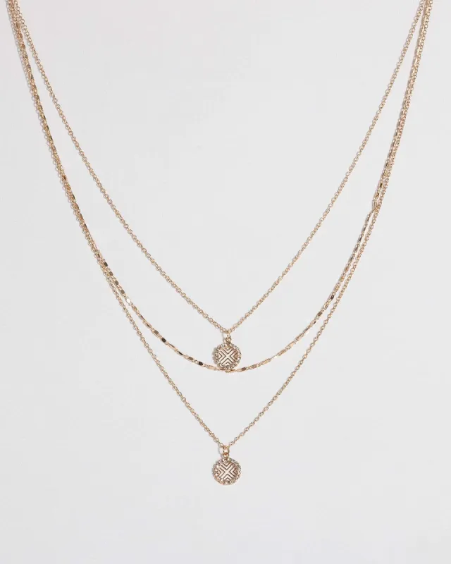 Gold Fine Cross Multi Necklace sold by Collete Hayman