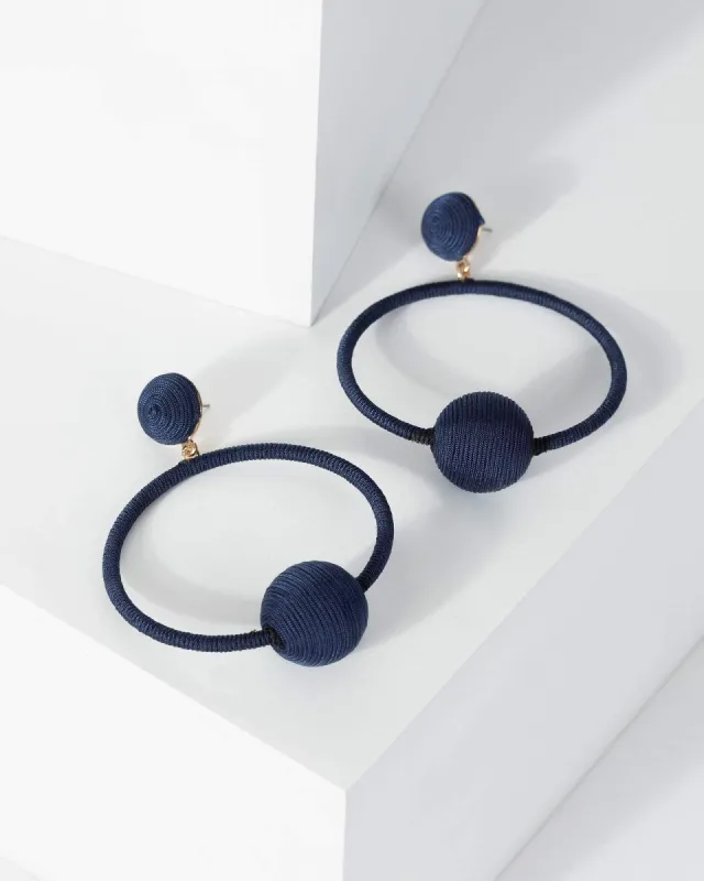 Navy Blue Thread Wrapped Circle Earrings sold by Collete Hayman