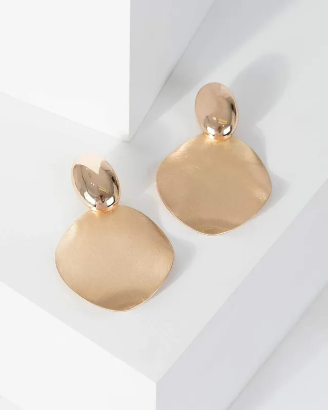 Gold Brushed Circle Drop Earrings sold by Collete Hayman
