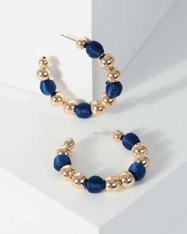 Navy Blue Wrapped Bead Hoop Earrings sold by Collete Hayman