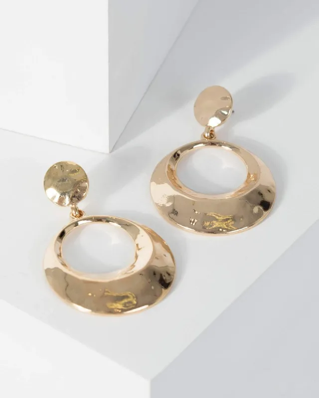 Gold Hammered Door Knocker Earrings sold by Collete Hayman