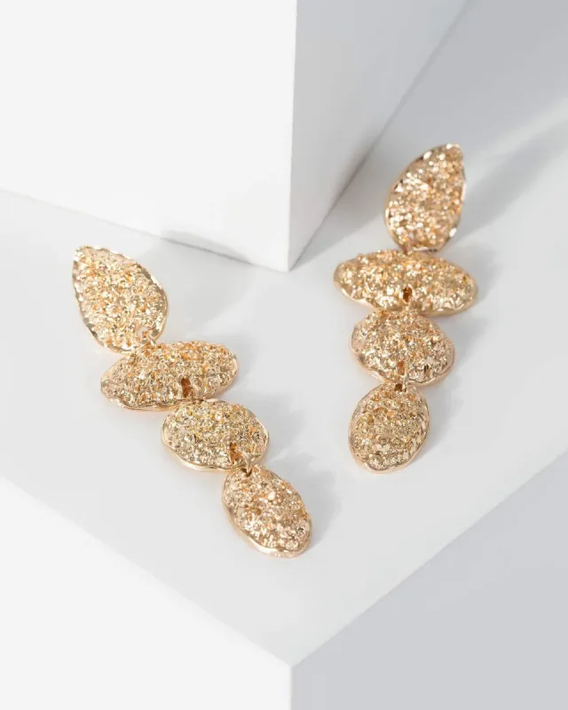 Gold Textured Drop Metal Earrings sold by Collete Hayman