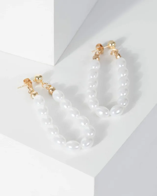 Gold Pearl And Bead Detail Round Earrings sold by Collete Hayman