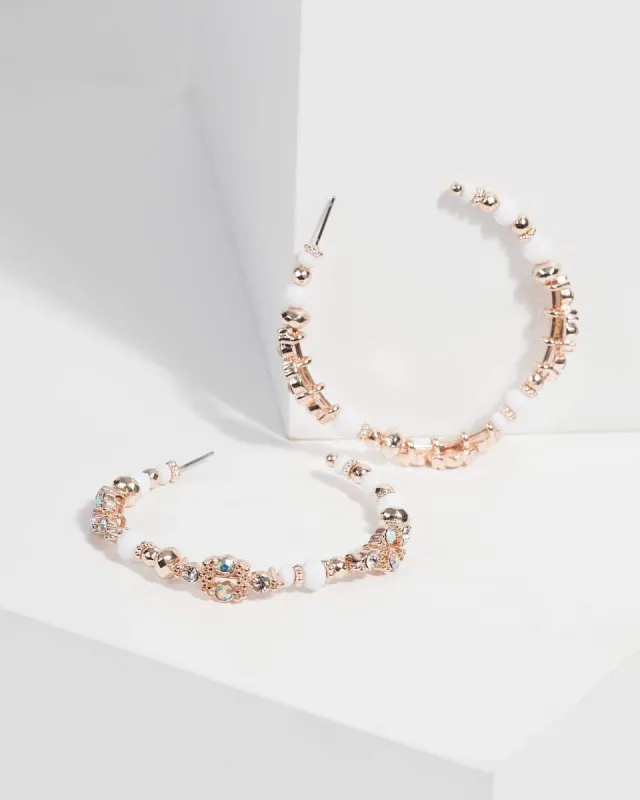 Pink Beaded Hoop Earrings sold by Collete Hayman