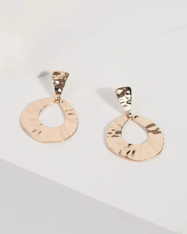 Gold Hammered Drop Earrings sold by Collete Hayman