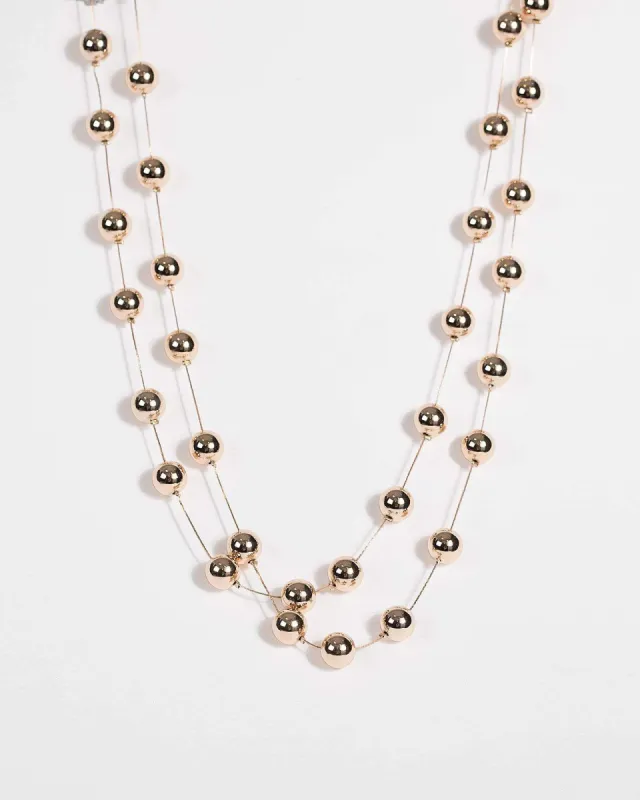 Gold Beaded Long Strand Necklace sold by Collete Hayman