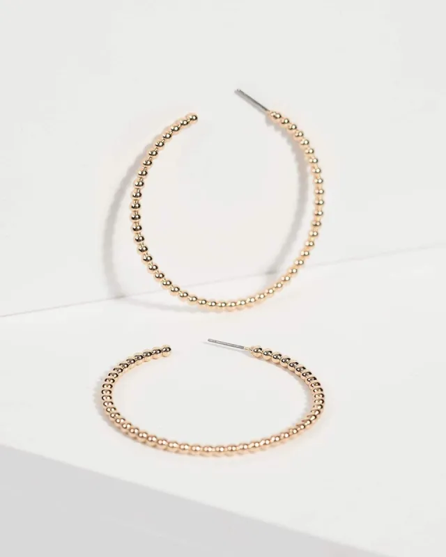 Gold Large Ball Hoop Earrings sold by Collete Hayman
