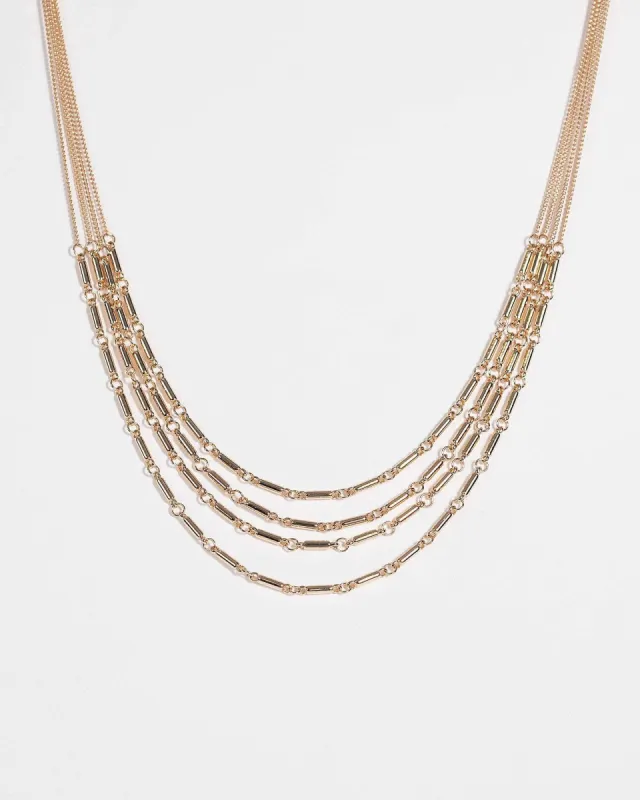Gold Multi Layered Metal Necklace sold by Collete Hayman