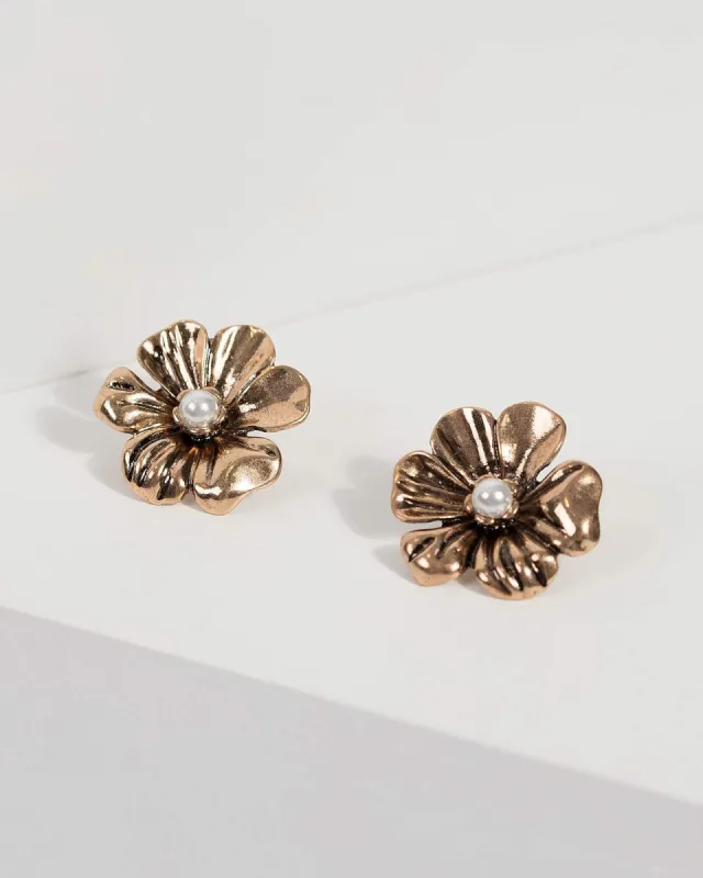 Gold Flower Stud Earrings sold by Collete Hayman