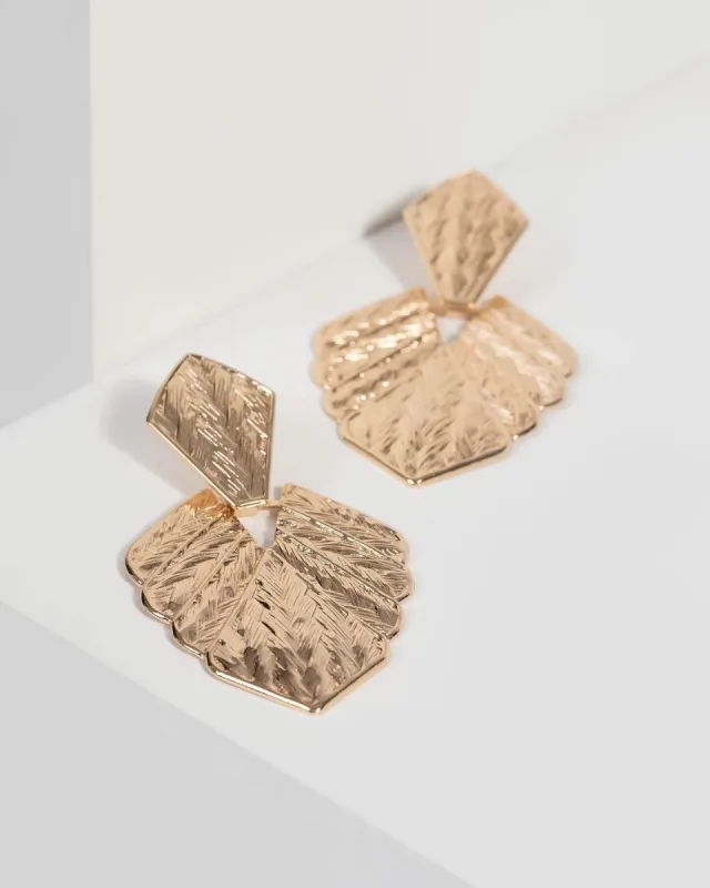 Gold Textured Metal Drop Earrings sold by Collete Hayman