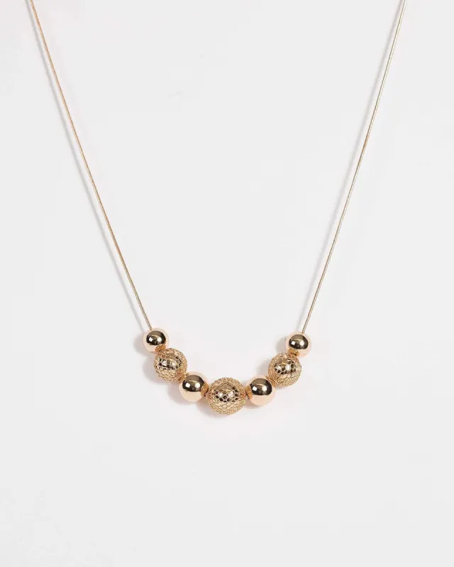 Gold Brushed and Mesh Beaded Necklace sold by Collete Hayman