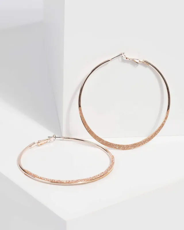 Rose Gold Metal and Glitter Hoop Earrings sold by Collete Hayman
