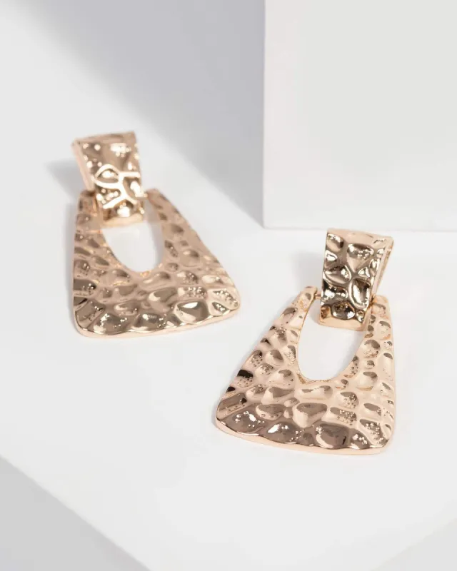 Gold Metal Doorknocker Earrings sold by Collete Hayman