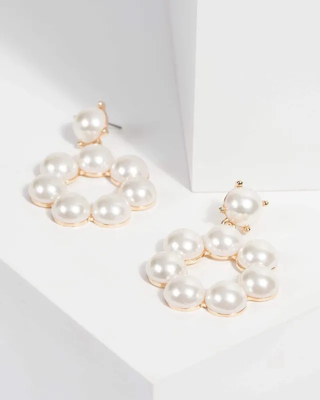 Pearl Circle Drop Earrings sold by Collete Hayman
