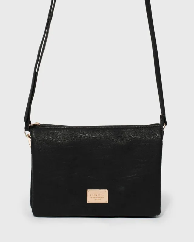 Black Triple Pocket Crossbody Bag sold by Collete Hayman