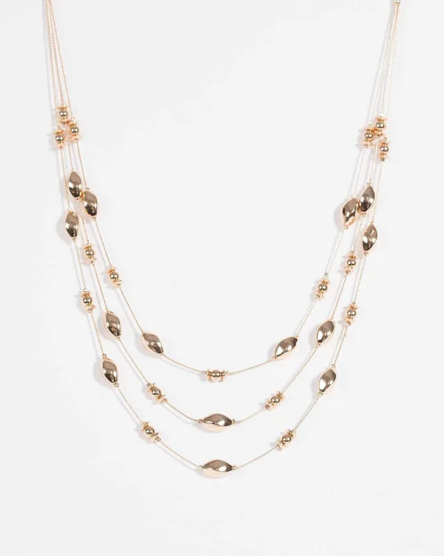 Gold Beaded Multi Strand Necklace sold by Collete Hayman