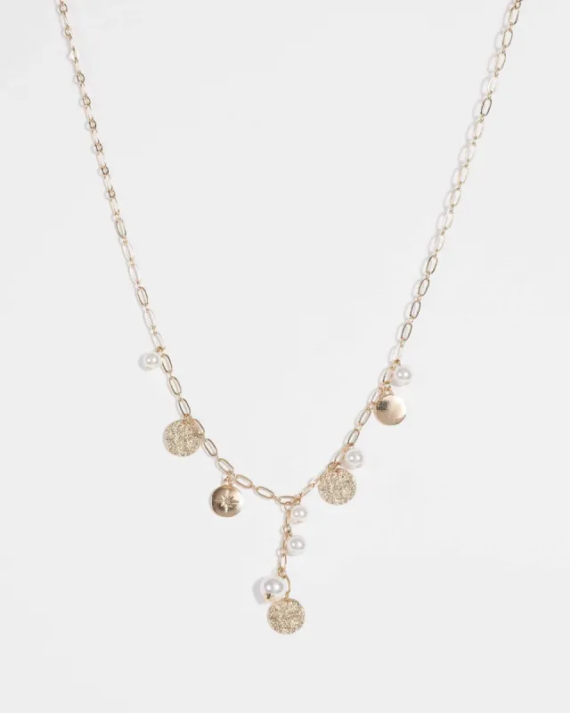 Pearl and Metal Disc Necklace sold by Collete Hayman