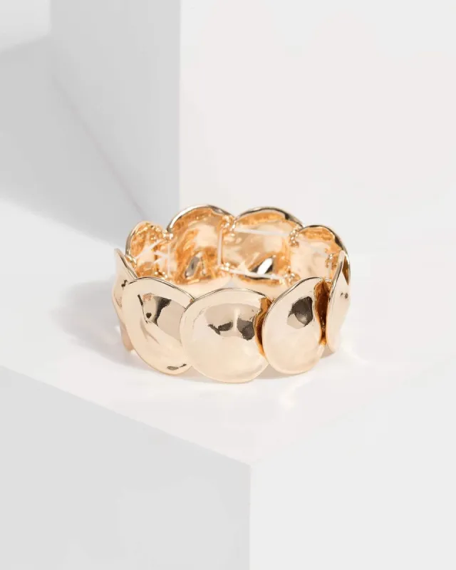 Gold Organic Disc Stretch Bracelet sold by Collete Hayman