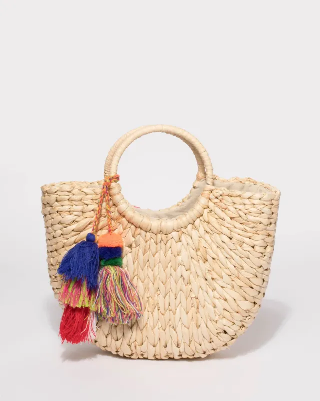 Natural Pom Pom Straw Basket Bag sold by Collete Hayman