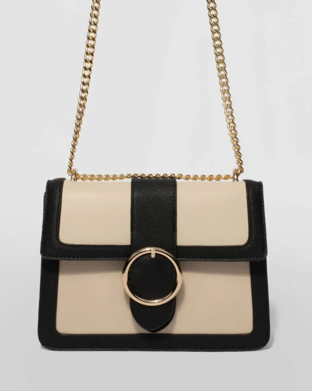 Black and Ivory Round Buckle Crossbody Bag sold by Collete Hayman