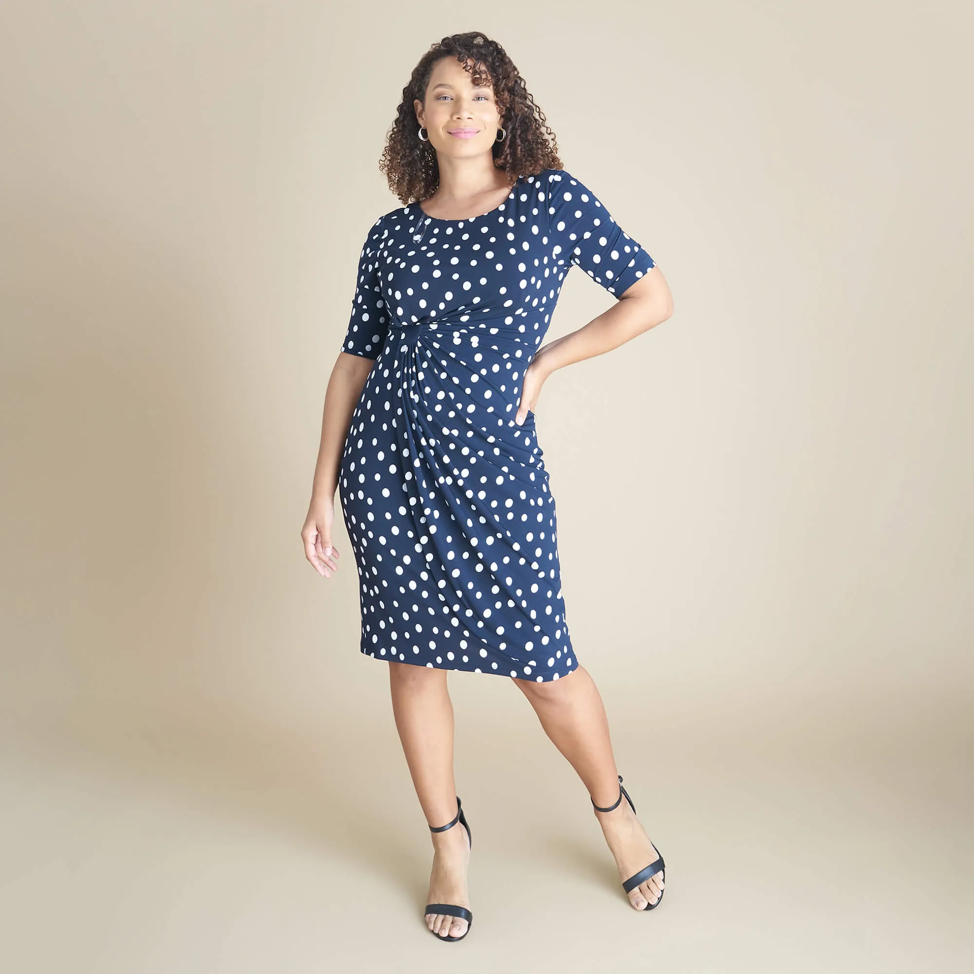 Lisa Navy Polka Dot Faux Wrap Dress sold by connected apparel