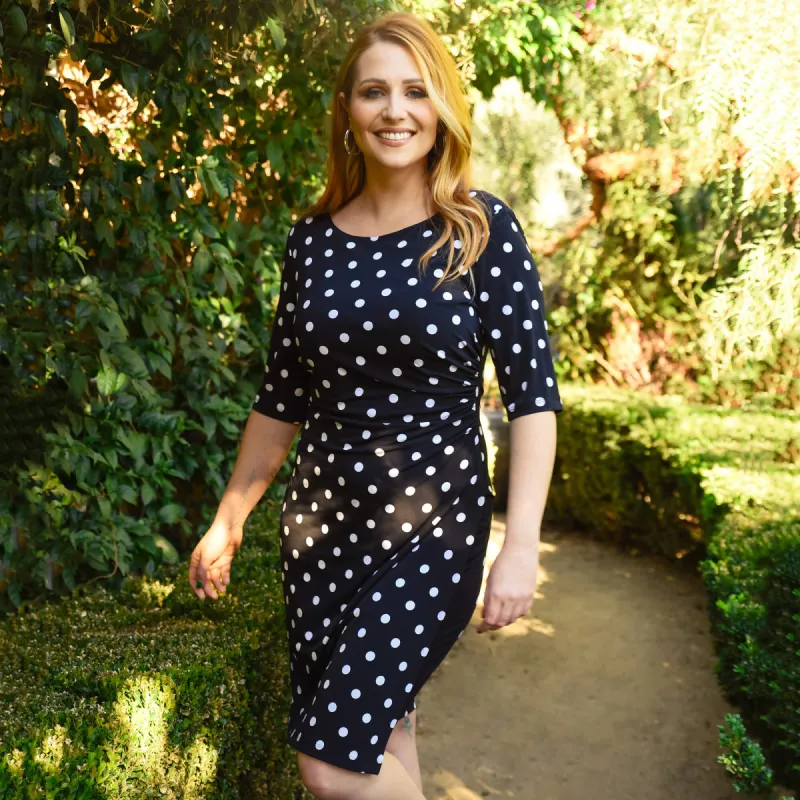 Liz Black Polka Dot Faux Wrap Dress sold by connected apparel
