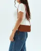 Brandy Uptown Crossbody sold by Consuela