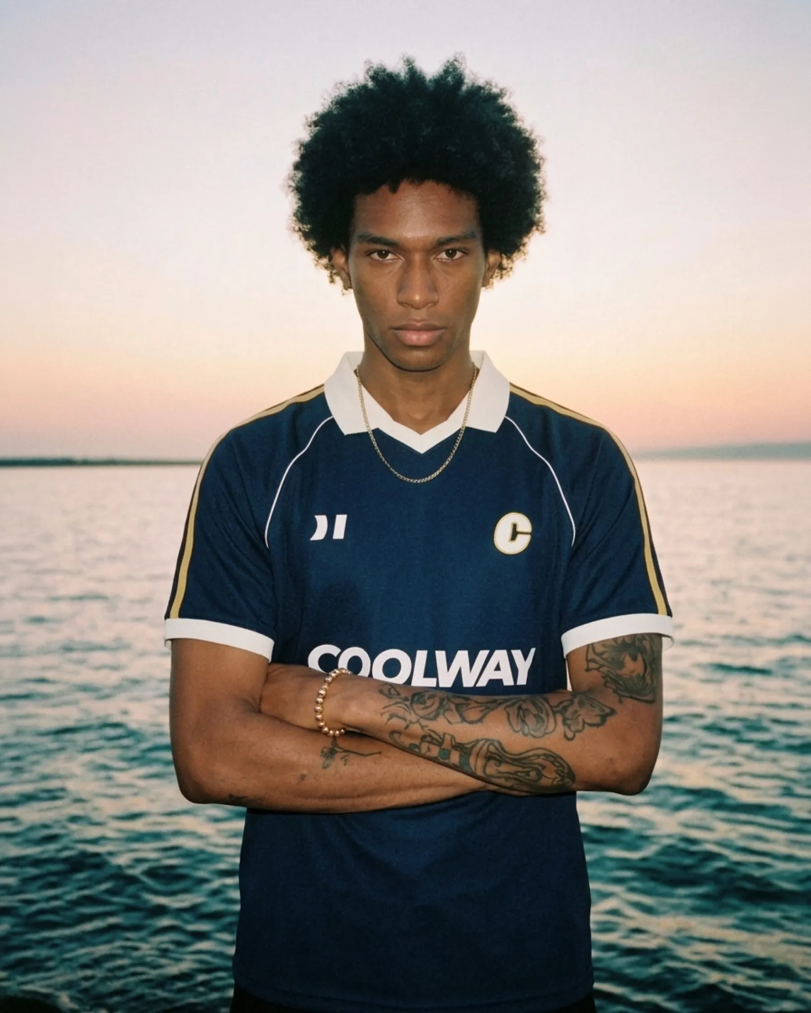 Navy Ink Football Tee sold by Coolway