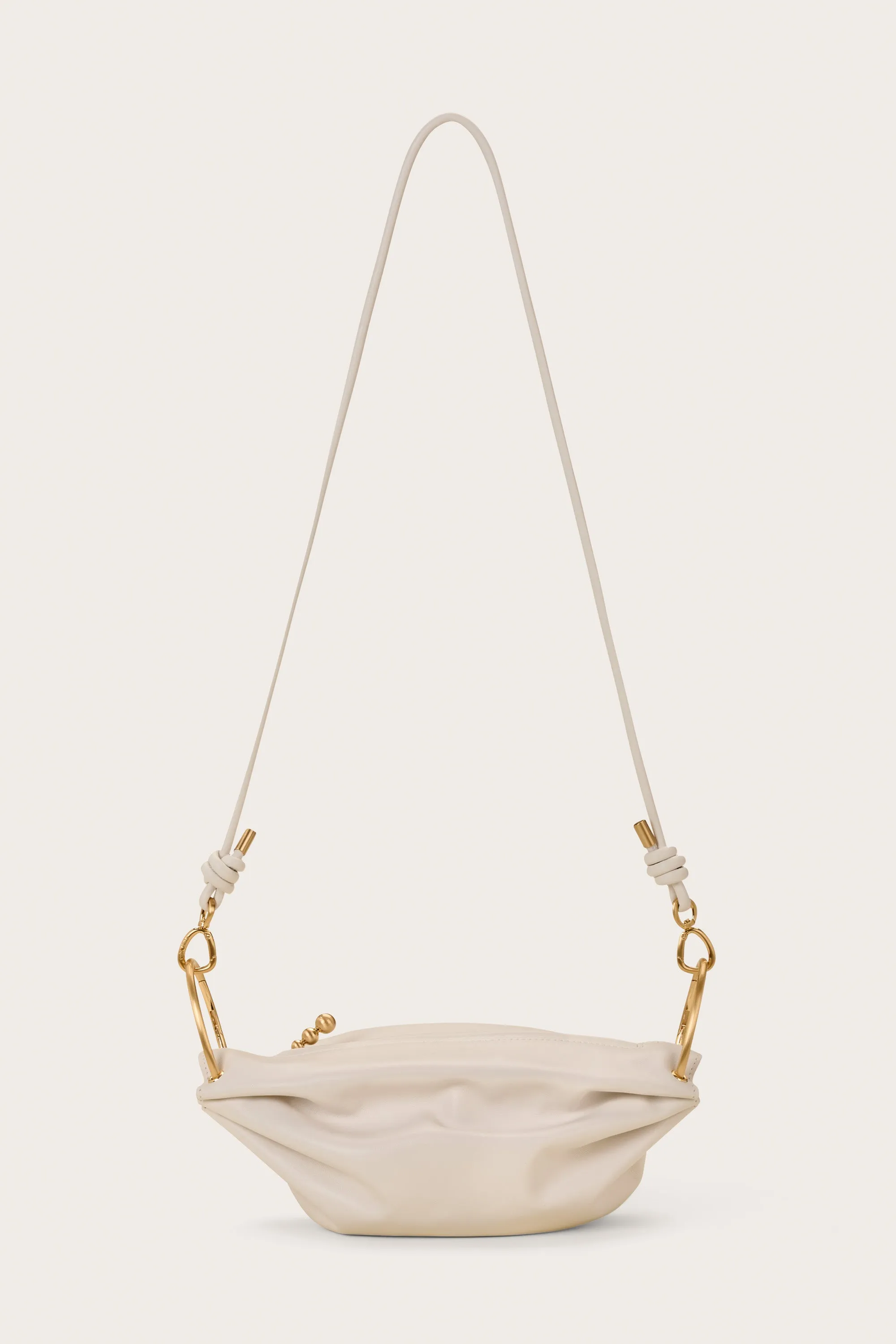CINCH CROSSBODY BAG - ANTIQUE WHITE sold by Cult Gaia
