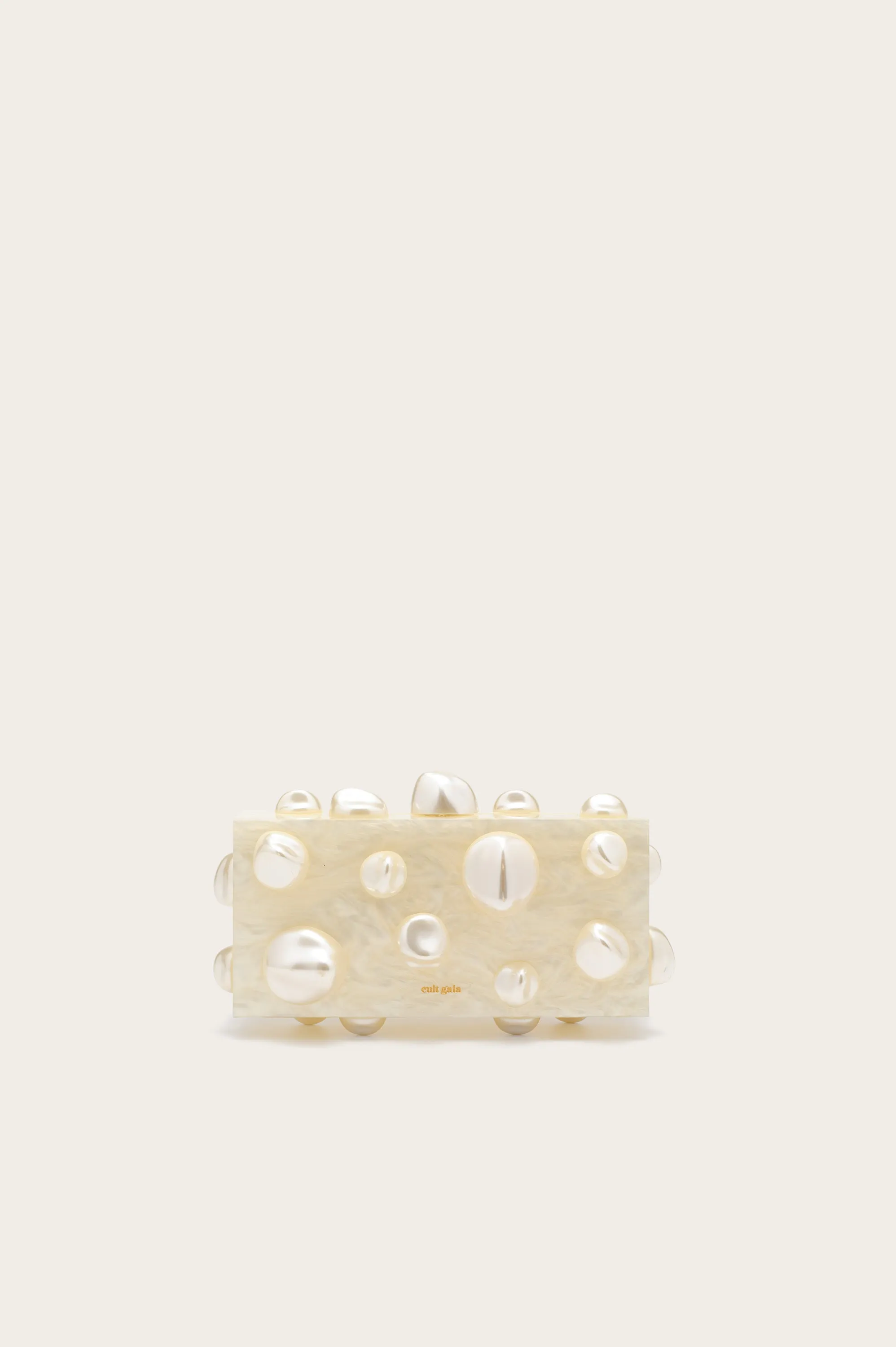 ORBS CLUTCH - IVORY sold by Cult Gaia