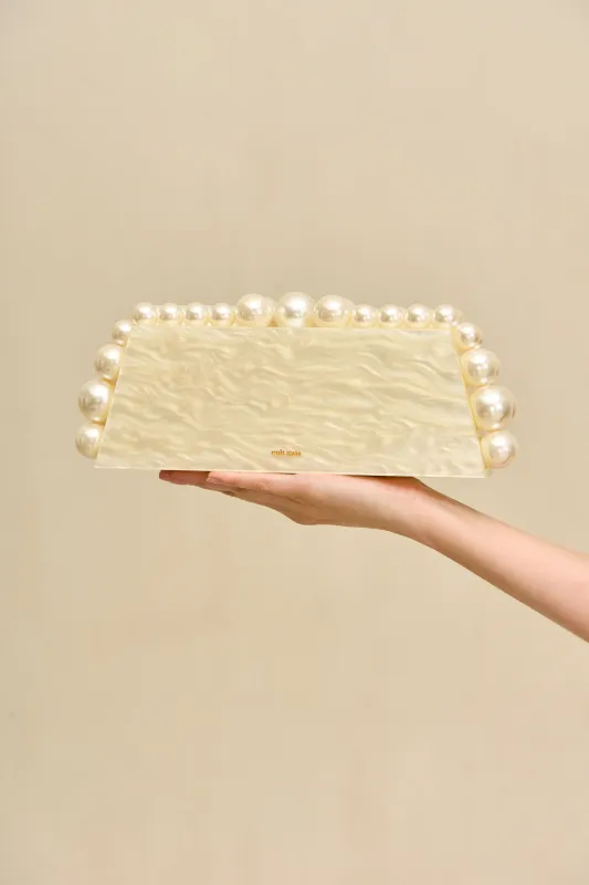 EOS LUNGO CLUTCH - IVORY made by Cult Gaia
