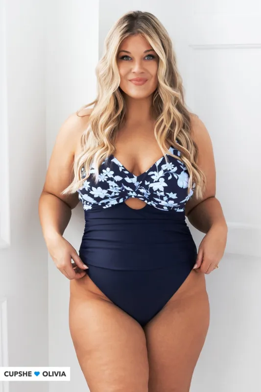 Eden Floral Plunge Ruched Wrap Front Cutout One Piece Swimsuit sold by Cupshe