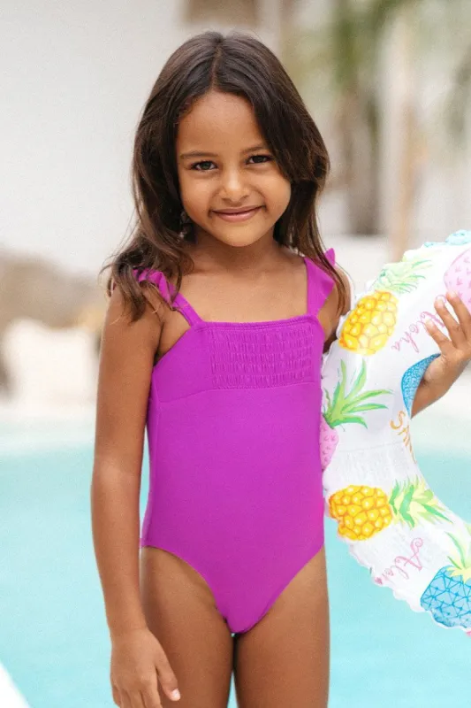Girls’ Omniscient Solid Smocked Ruffled One Piece Swimsuit sold by Cupshe