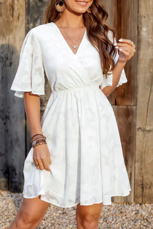 Alyson Floral Jacquard Flowy Mini Dress sold by Cupshe