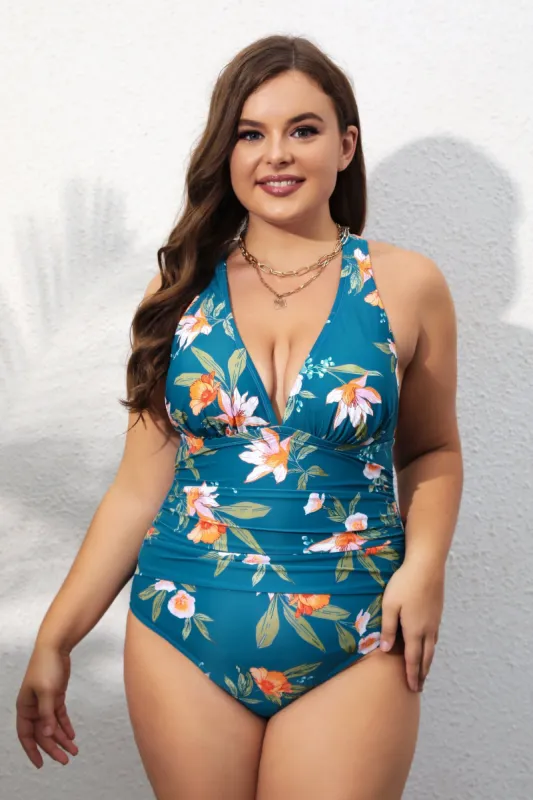 Fantasy Teal Flowers Plunge Ruched Plus Size One Piece Swimsuit sold by Cupshe