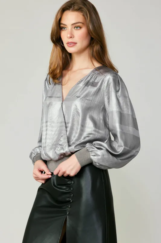 Metallic Surplice Blouse sold by Current Air