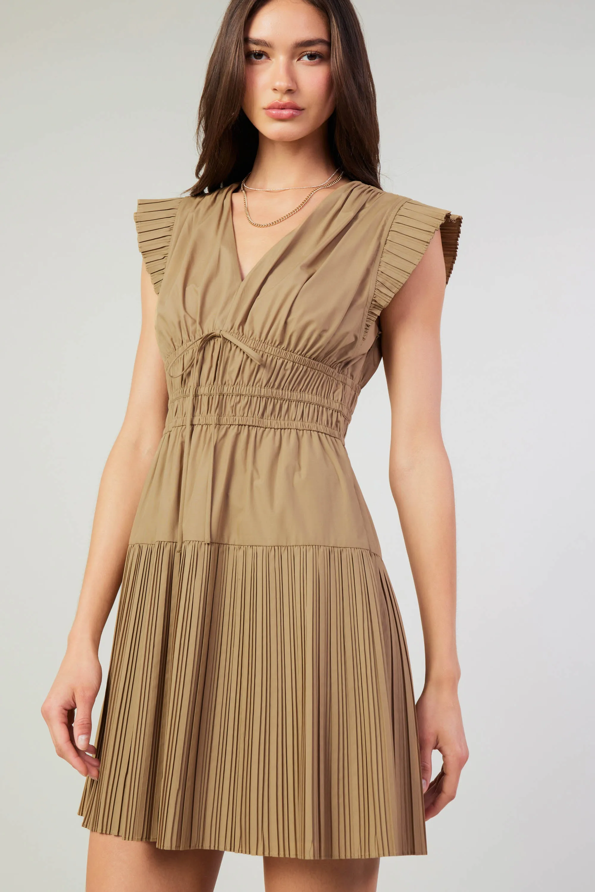 Briene Pleated Mini Dress sold by Current Air