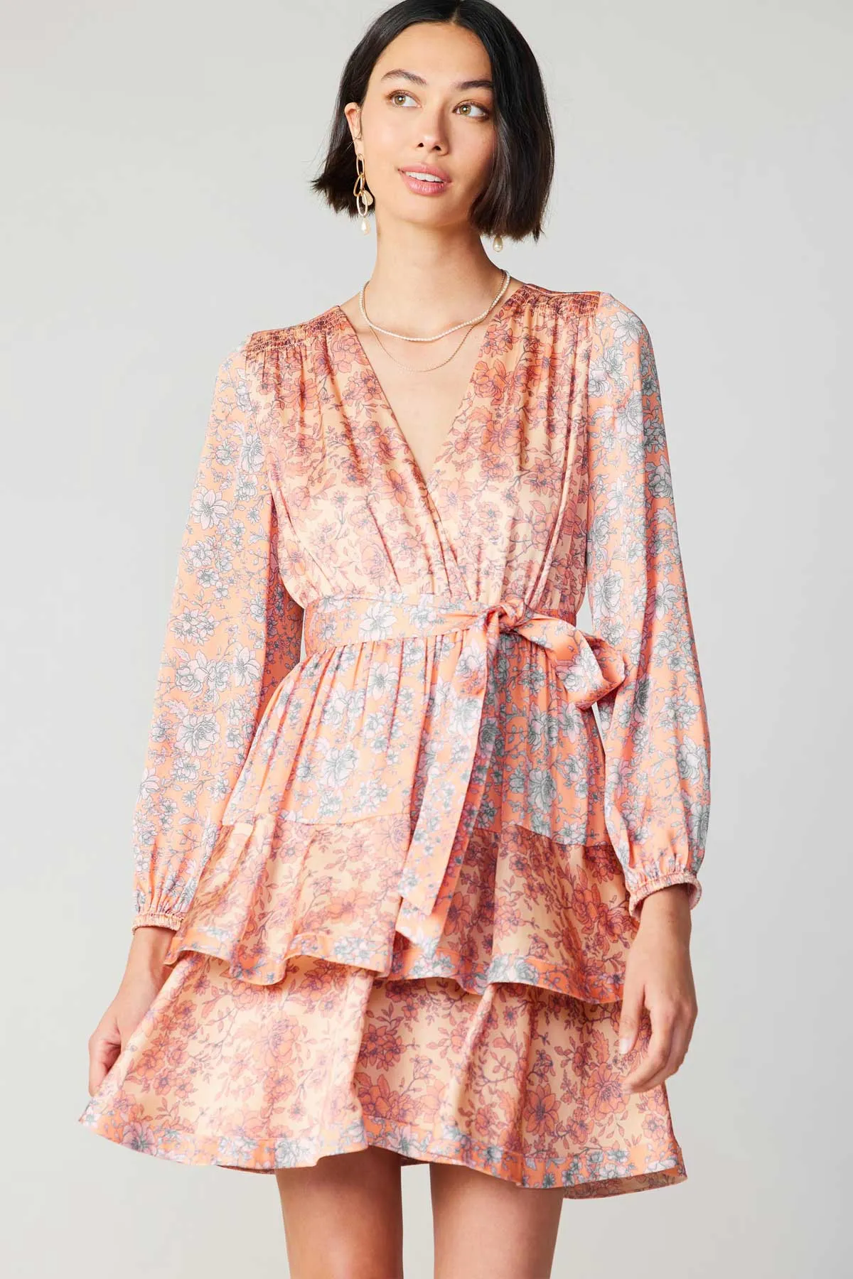 Floral Surplice Mini Dress sold by Current Air