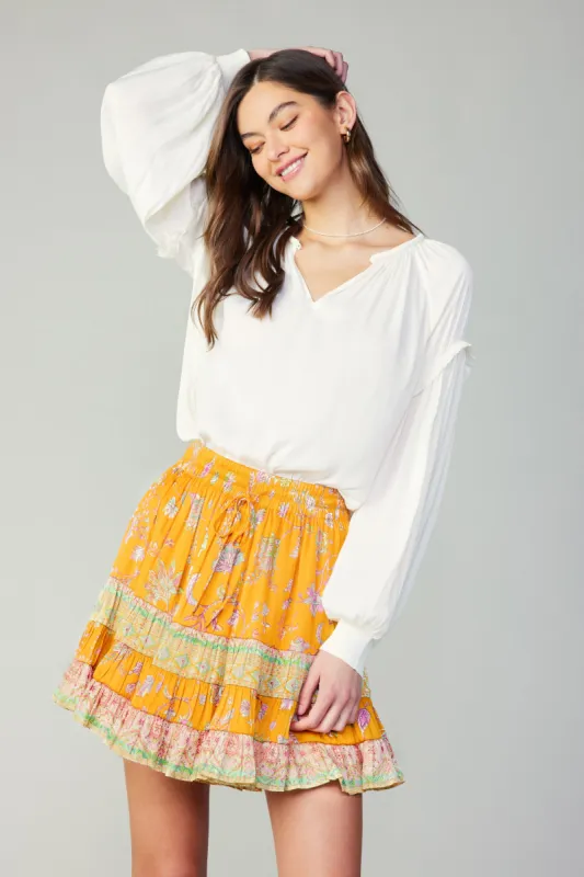 Border Print Tiered Mini Skirt sold by Current Air
