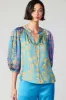 Floral Colorblock Cuffed Blouse sold by Current Air
